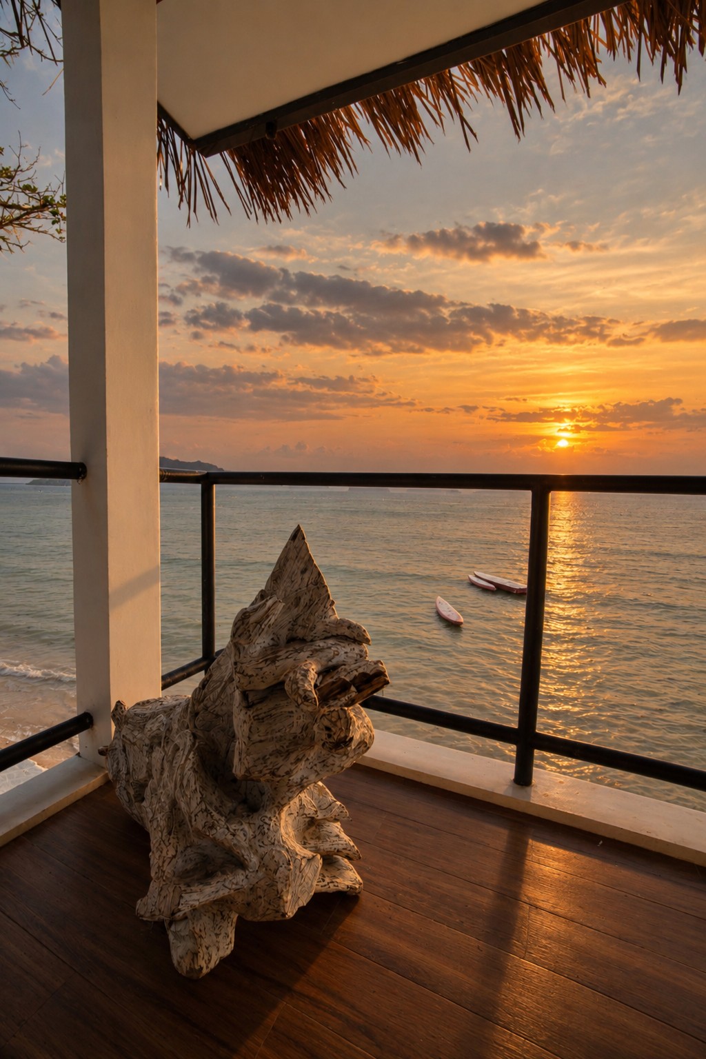 Driftwood balcony sunset view at Gypsy and the Hippie, El Nido
